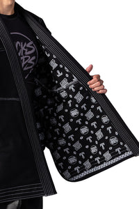 Tricks and Traps jiu jitsu Gi jacket. Features a 550gsm pearl weave jacket with our signature print on the inside.