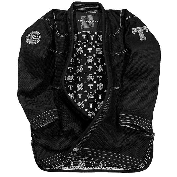 Premium jiu jitsu kimono. 550gsm pearl weave jacket with 10oz ripstop pants. High quality jiu jitsu gi featuring a black and silver colorway.
