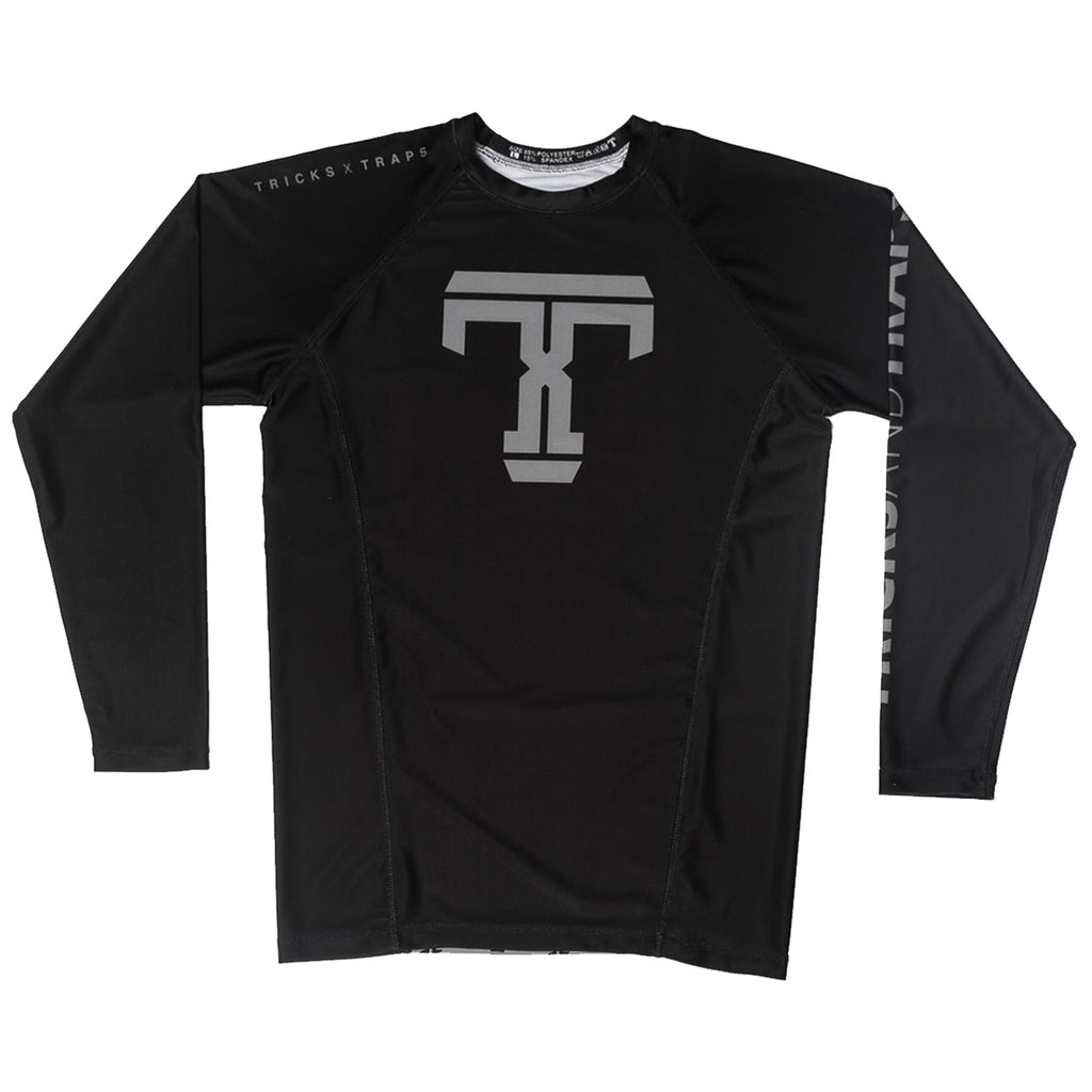 Tricks x Traps long sleeve jiu jitsu rashguard.