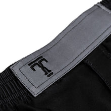 Load image into Gallery viewer, Our Tricks and Traps jiu jitsu shorts feature a two way velcro enclosure for extra support. 